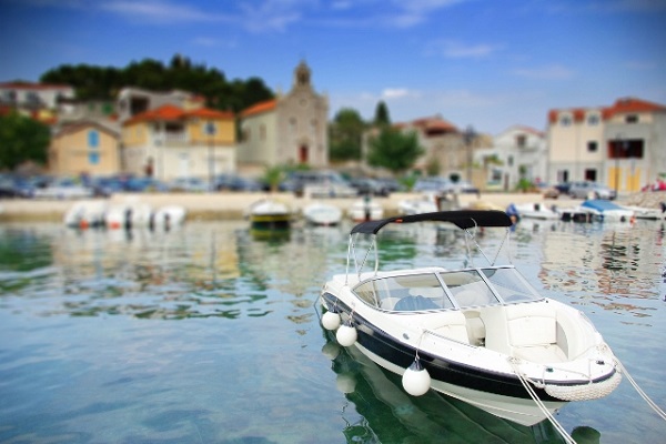 Motorboat moored in the old harbor or marina, Croatia Dalmatia